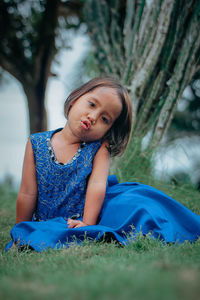 Portrait of girl on field