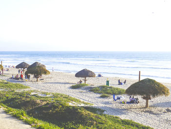 Scenic view of beach against clear sky