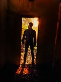 Man standing in corridor