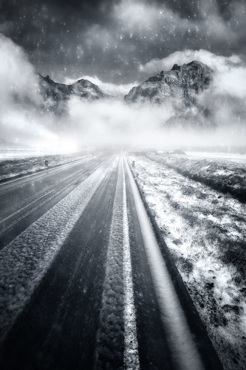 ROAD PASSING THROUGH LANDSCAPE