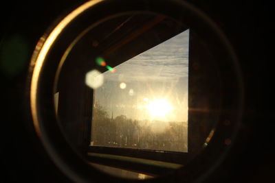 Reflection of sky on side-view mirror