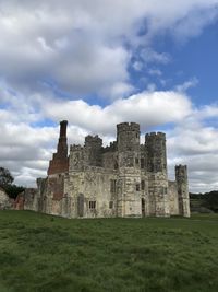 Historic building against cloudy sky