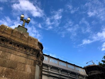 Low angle view of historical building against blue sky