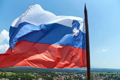 Low angle view of flag against sky