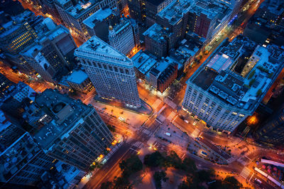 High angle view of illuminated cityscape at night