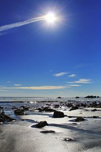 Scenic view of sea against sky at sunset