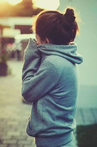 Side view of a girl wearing hoodie