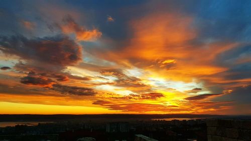 Scenic view of dramatic sky during sunset