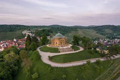 High angle view of trees and buildings against sky