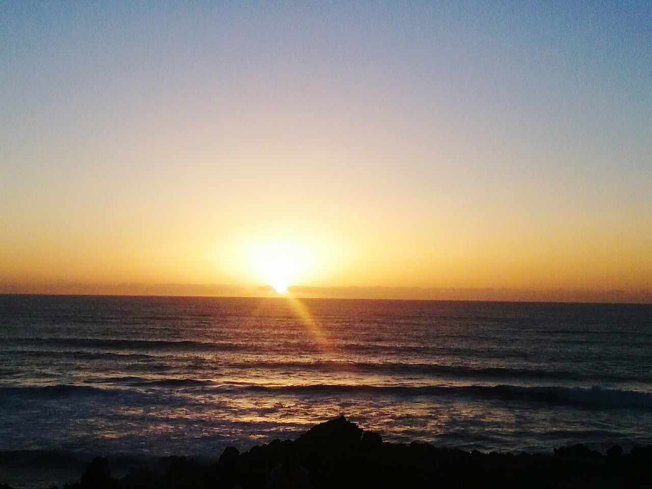 sunset, sea, horizon over water, beauty in nature, beach, water, sun, nature, scenics, tranquility, tranquil scene, sunlight, idyllic, sky, no people, outdoors, sand