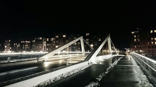 Illuminated street lights at night