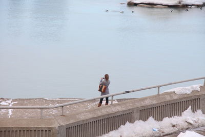 Woman standing on beach