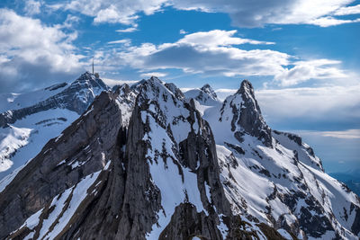 Panoramic view of snowcapped mountains against sky