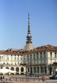 Low angle view of building against clear blue sky