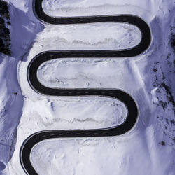 High angle view of snow covered car