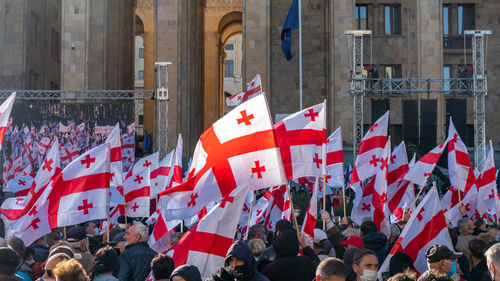 Group of people protesting on street