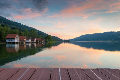 Scenic view of lake against sky during sunset