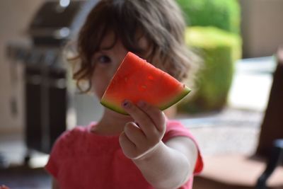 Close-up of girl holding watermelon