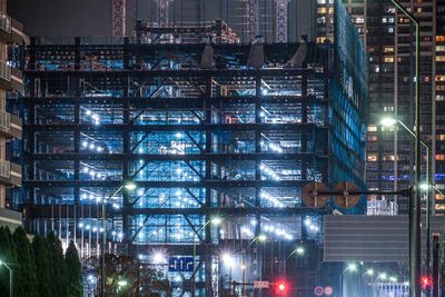 Illuminated buildings in city at night