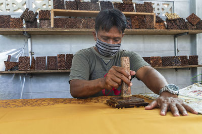 Man working on table