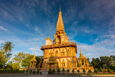 Statue of temple against cloudy sky