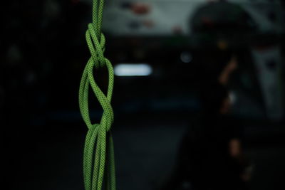 Close-up of rope tied to bollard