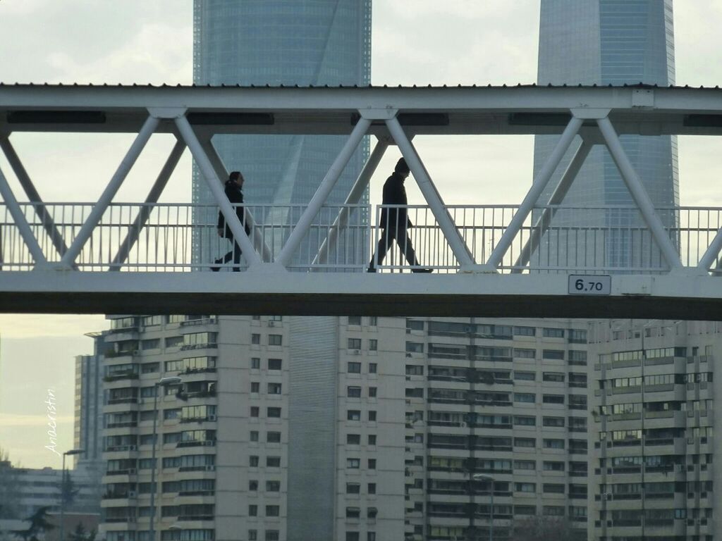 architecture, built structure, building exterior, city, modern, low angle view, office building, skyscraper, glass - material, building, reflection, sky, tall - high, tower, window, city life, day, outdoors, no people, development