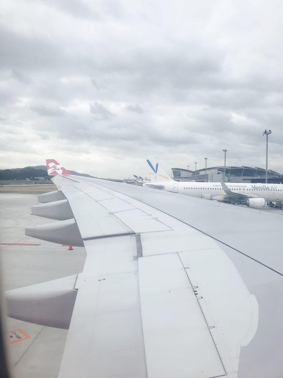 airplane, air vehicle, transportation, cloud - sky, mode of transportation, sky, aircraft wing, travel, day, airport, flying, no people, nature, public transportation, outdoors, airport runway, commercial airplane, beauty in nature, journey, aerospace industry, plane