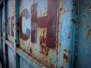 Full frame shot of old rusty metal door container 