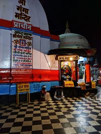 Full length of man at illuminated temple