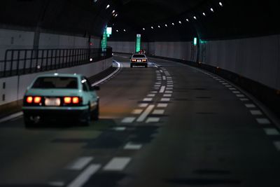 Traffic on road in city at night