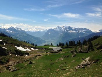 Scenic view of swiss alps mountains against sky