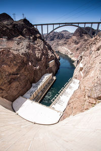 High angle view of hover dam amidst mountains