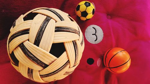 High angle view of multi colored balls in basket