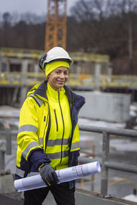 Female engineer at building site