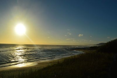 Scenic view of sea at sunset