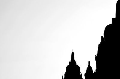 Ancient temple against clear sky