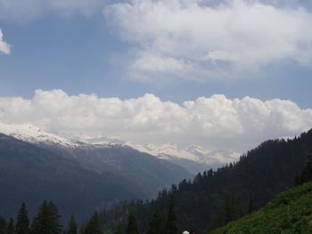 Scenic view of mountains against sky during winter