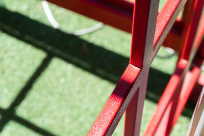 High angle view of metallic structure on grass