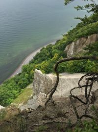 High angle view of rocks by sea