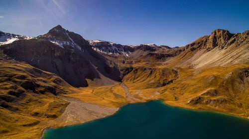 Scenic view of mountains against clear sky