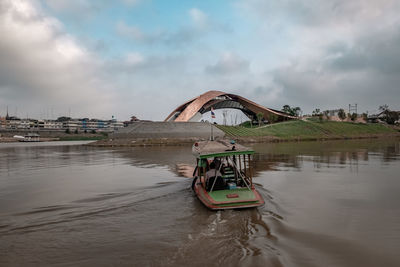 Bridge over river against sky