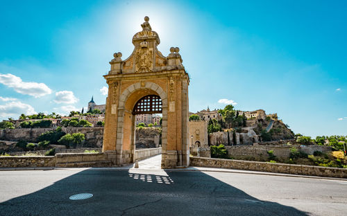 View of historical building against cloudy sky