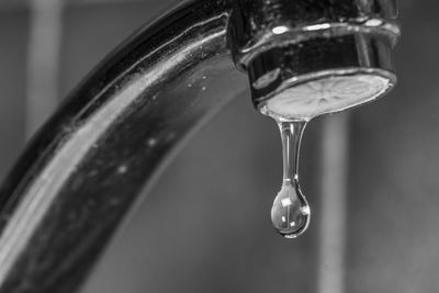 Close-up of water falling from faucet