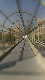 People walking in tunnel