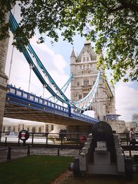 Bridge against sky in city