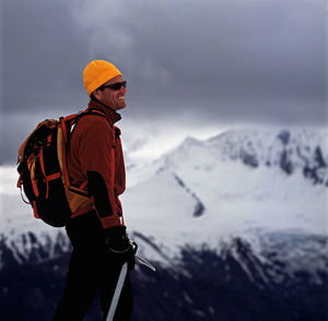 Man enjoying the view on top of vatnajokull glacier in iceland