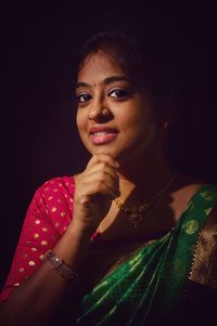 Portrait of a young woman looking away
