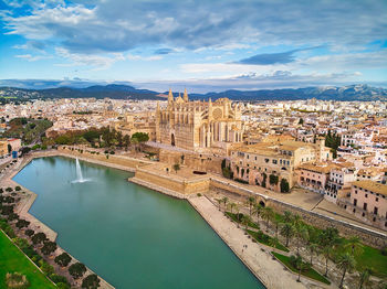 High angle view of canal and buildings in city