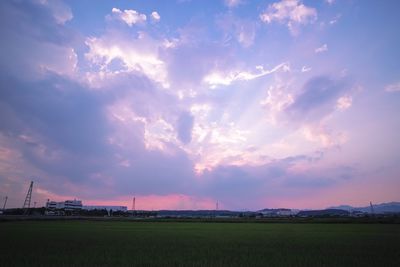 Scenic view of landscape against blue sky